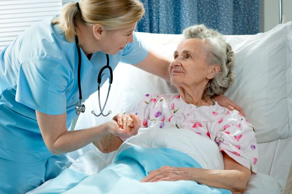 Nurses take care of old women