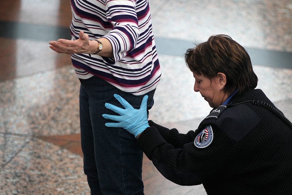 TSA Security searching a women